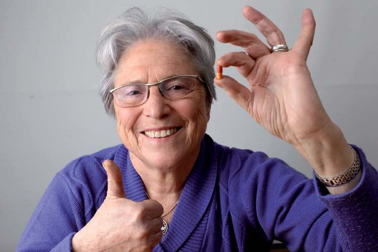 Prof. Marta Weinstock-Rosin holding Exelon pill